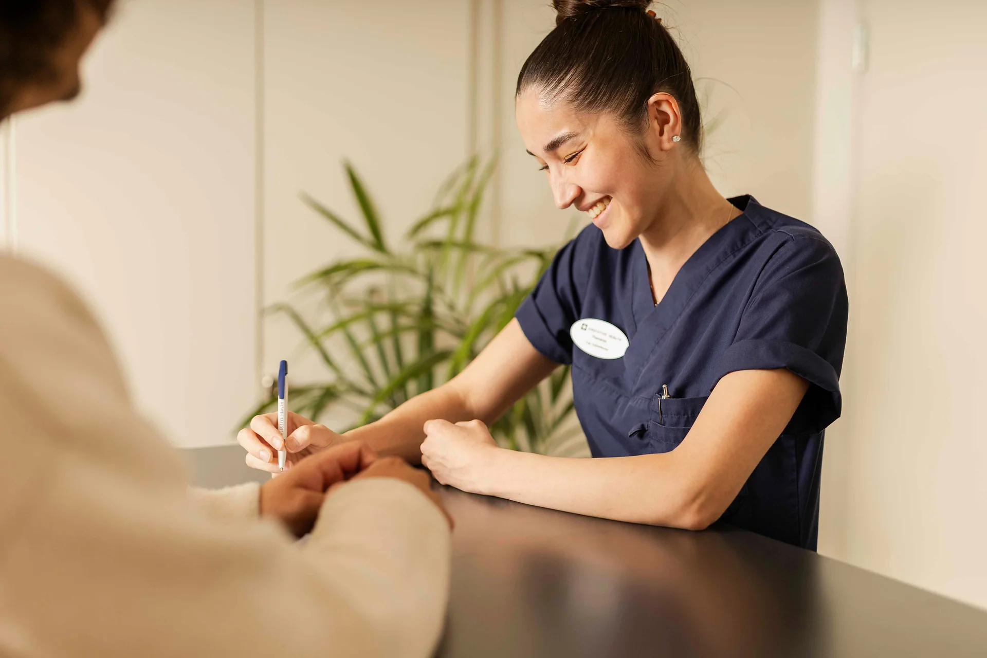 Executive Health clinician documenting results